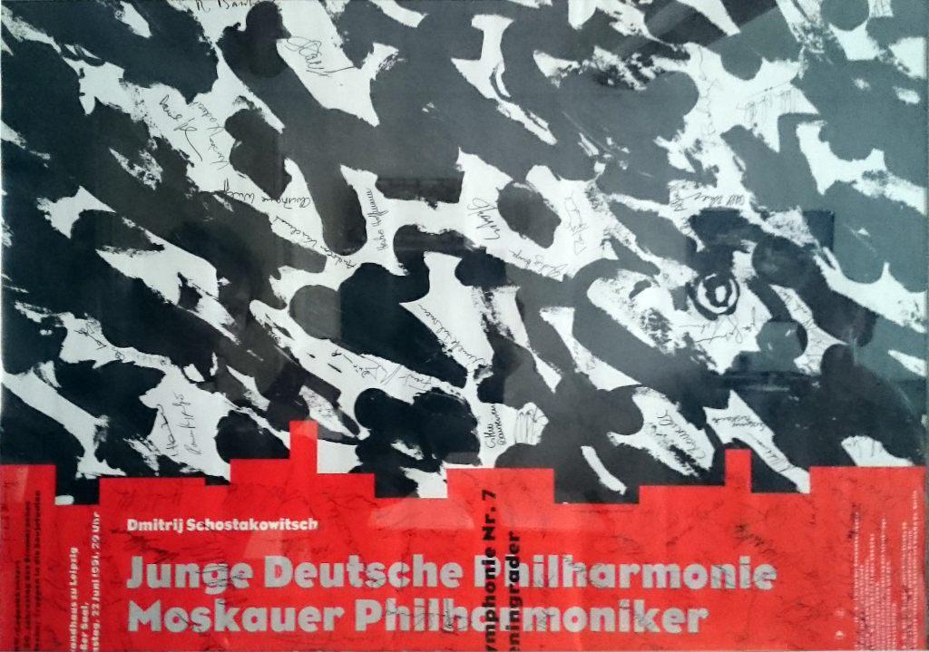 Poster of the concert of the Junge Deutsche   Philharmonie. Signatures of all musicians of the   Orchestra are on the poster.